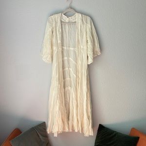 Free people cover up, size extra small but loose, open sizing. NWT